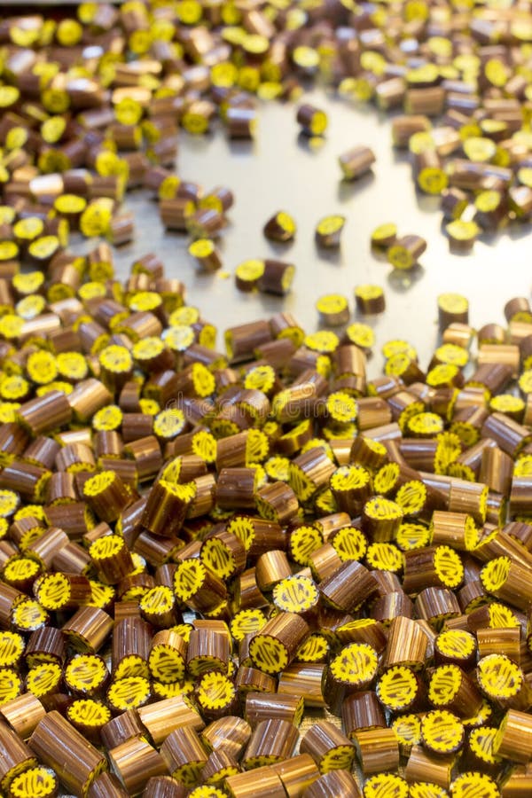 Candies in candy factory stock image