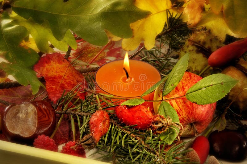 Candle and Autumnal foliage