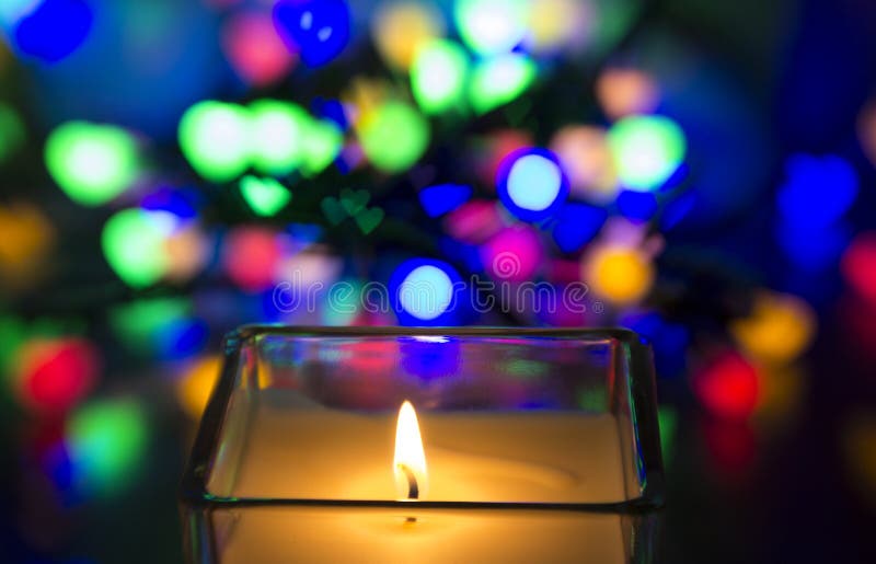 Candle burning with bokeh