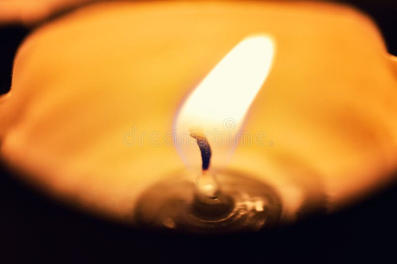 Candle burning in the dark stock image. Image of burn 70388791