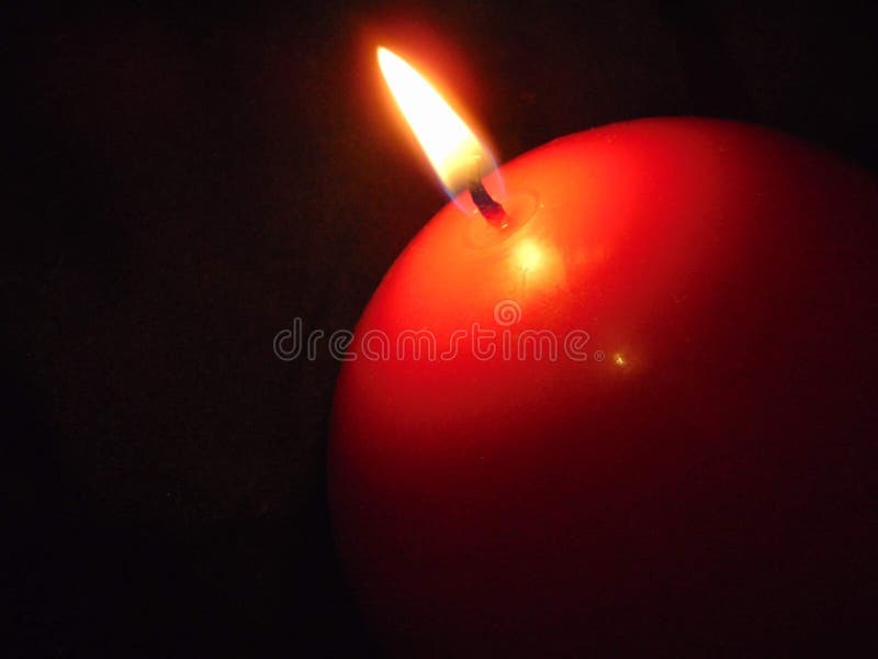 Candle burning in the dark stock image. Image of burning 96941847