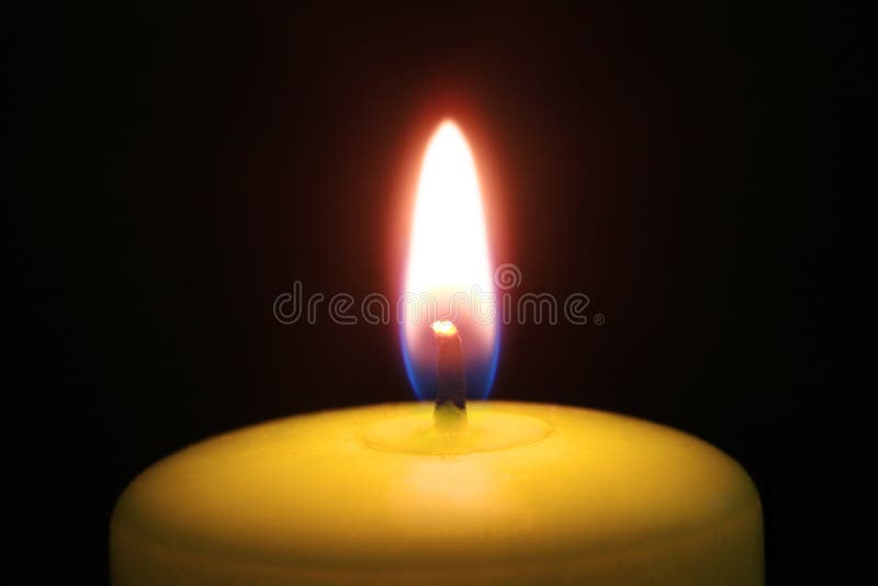 Candle burning in darkness stock image. Image of glows 6596735
