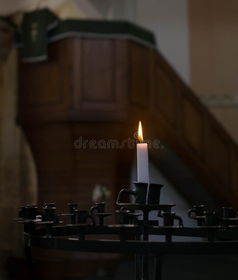 The candle in the Church stock image. Image of prayer 137214985