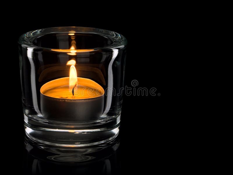 Candle in a glass candlestick