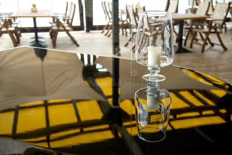 Candle on a grand piano in a restaurant royalty free stock photography Candle on a grand piano in a restaurant royalty free stock photography
