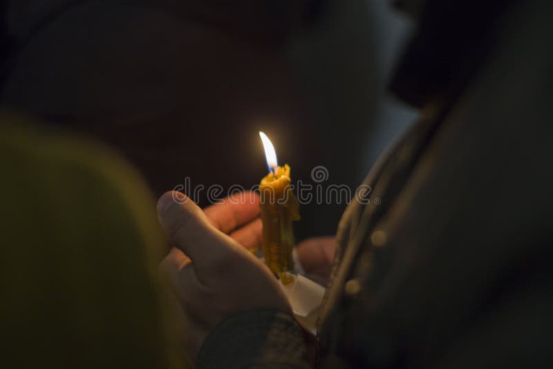 Candle in the hand of the believer royalty free stock image Candle in the hand of the believer royalty free stock image