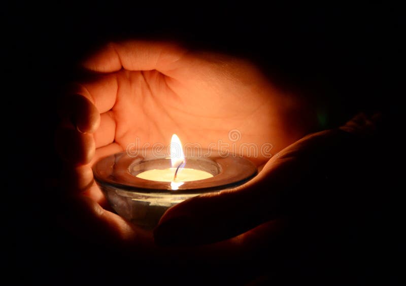 Candle in the hands stock image. Image of cupped, ceremonial 37386749