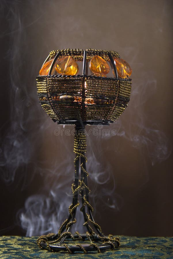 Candle holder in smoke stock photo. Image of beautiful 142820694