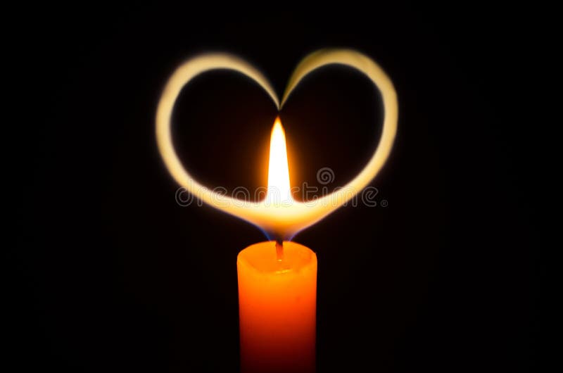 Candle light heart shape in the dark