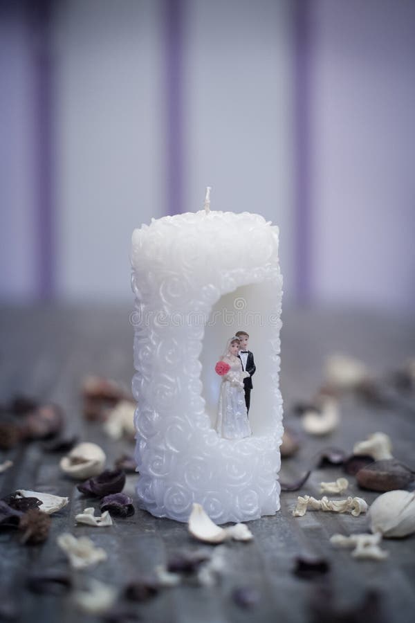 Candle with married couple stock photo. Image of ornamental 77970202