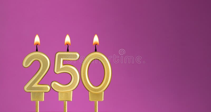 Candle number 250 in purple background - birthday card stock photography