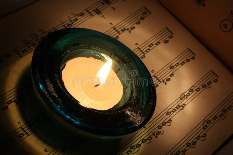 Candle on old note book