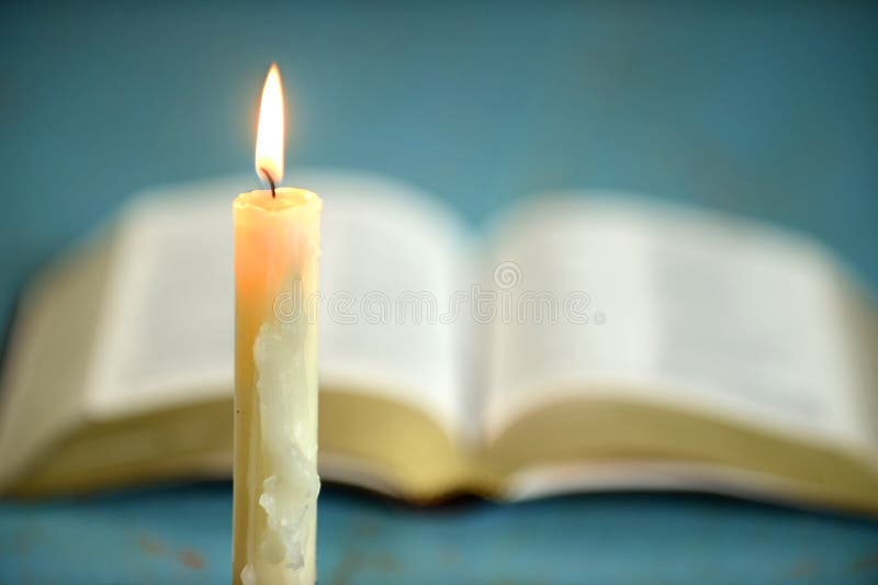 Candle with Open Bible in Background Stock Photo Image of book, pages