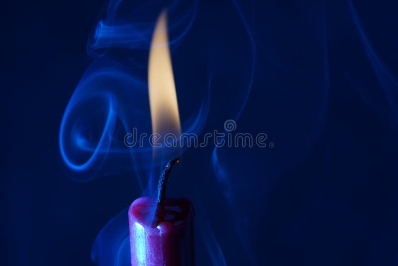 Candle with Smoke and Flame Photographed in the Studio with Color Foils