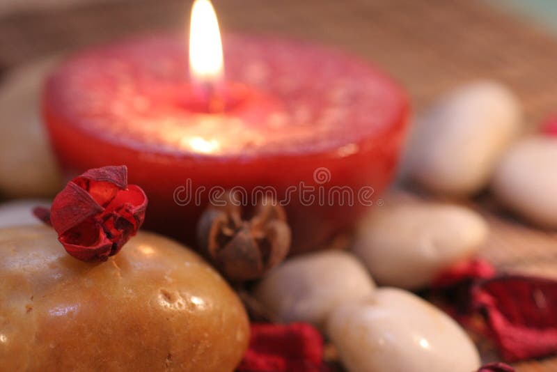 Candle and stone