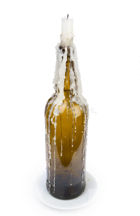 A candle stuck in a bottle stock image. Image of white 14193103