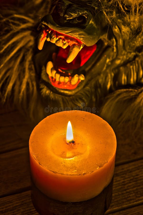 Candlelight illuminating the werewolf face HDR effect royalty free stock photo Candlelight illuminating the werewolf face HDR effect royalty free stock photo