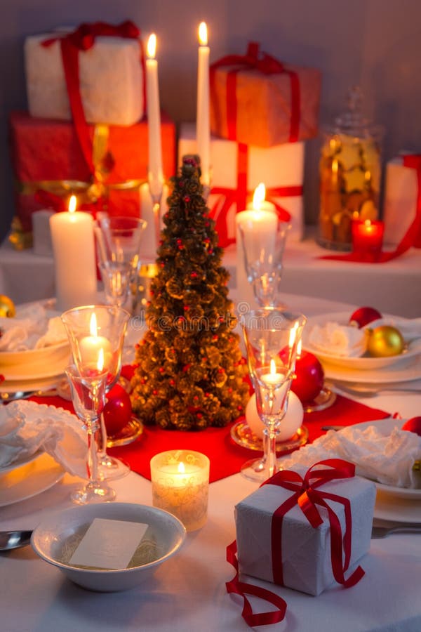 Candlelight, Wafer and Gifts on the Christmas Table Stock Photo - Image ...