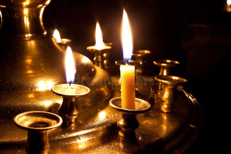 Candles burning in the church.