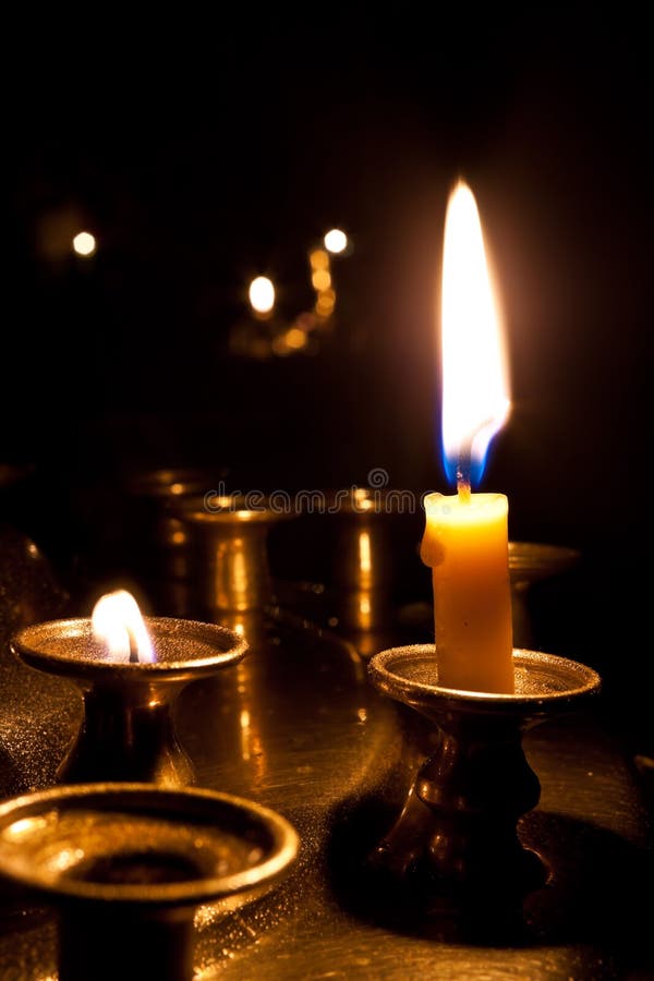 Candles burning in the church.