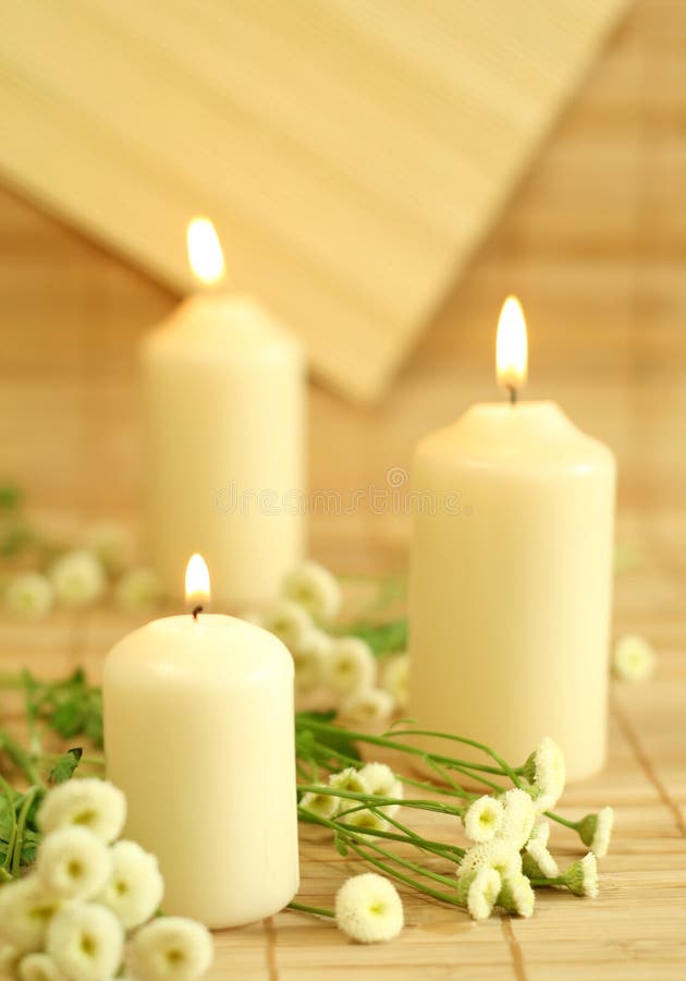 Candles and flowers.