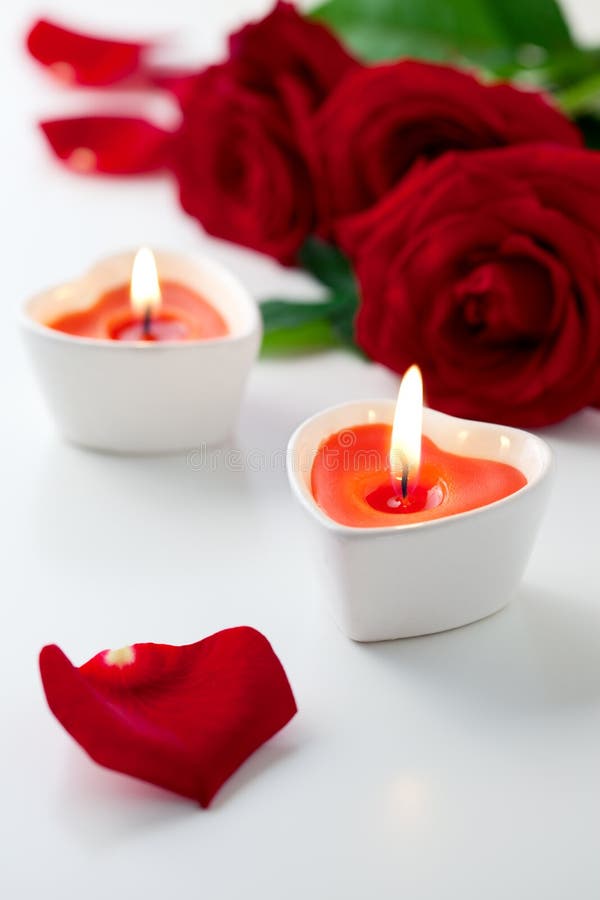 Candles and red roses for Valentine s Day