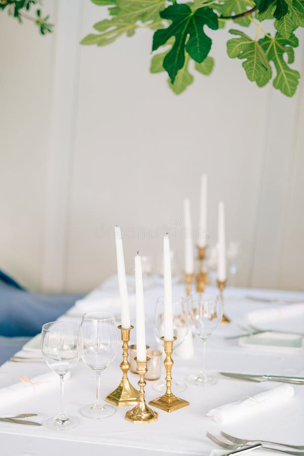 Candles on the Table in the Restaurant. Table Setting in a Cafe Stock