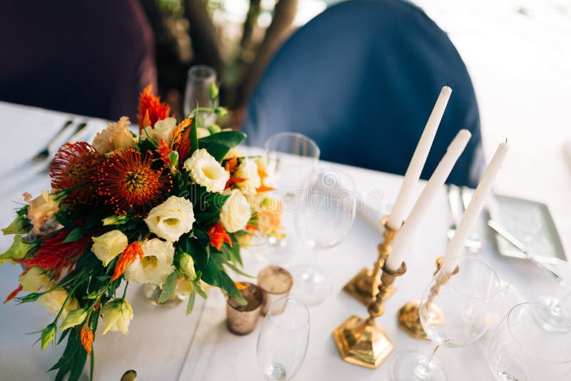 Candles on the Table in the Restaurant. Table Setting in a Cafe Stock