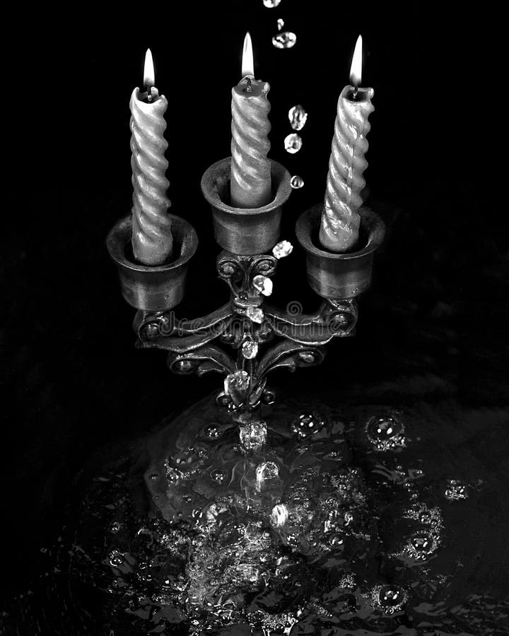 Candlestick with Burning Candles. Stock Photo Image of splashing