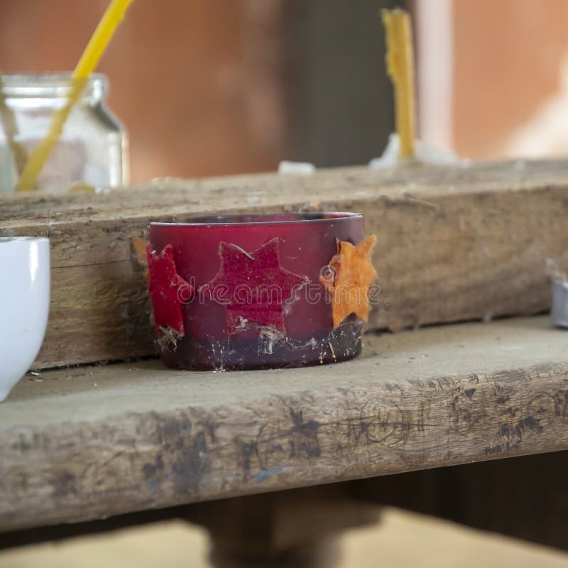 Candlesticks made of cups stock photo. Image of bible 217703362