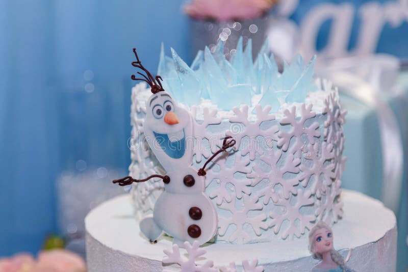 Izmail, Ukraine - February 2019. Candy bar, birthday cake for a girl with Olaf snowman, Frozen cartoon character from Walt Disney.