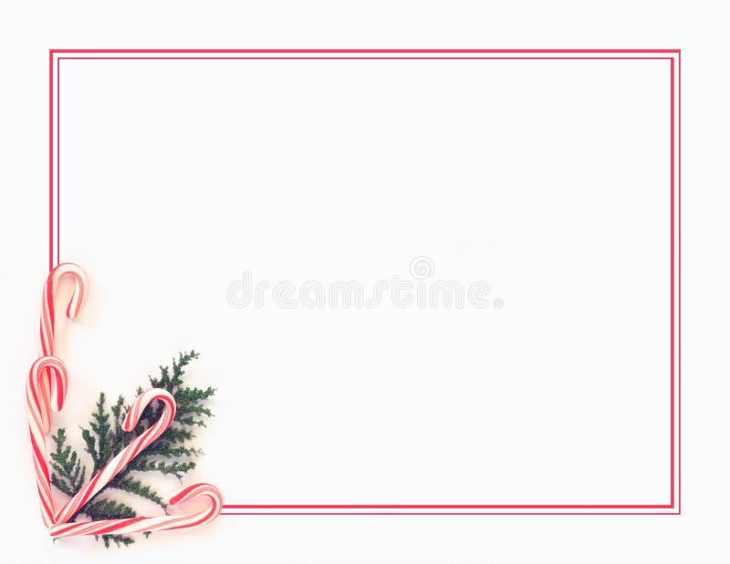 Candy canes and Christmas greenery form a background/border along with candy stripes. Space for your copy. Candy canes and Christmas greenery form a background/border along with candy stripes. Space for your copy.