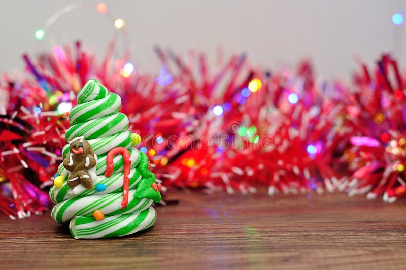 A Candy Cane Christmas Tree With Out Of Focus Tinsel And Lights Stock