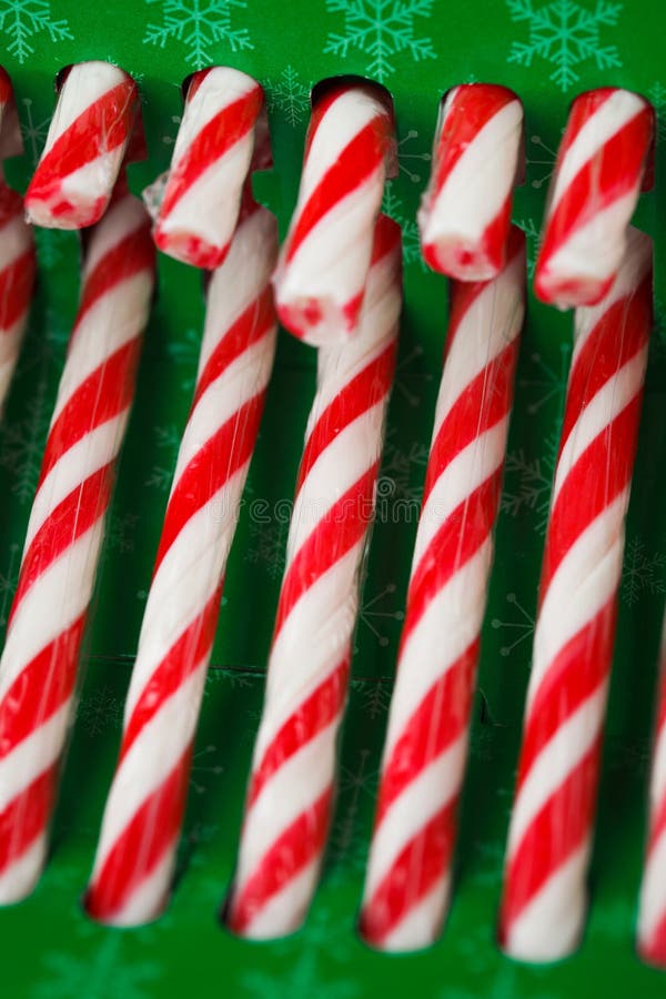 Candy canes in green pack stock photo. Image of lollipop 45279604