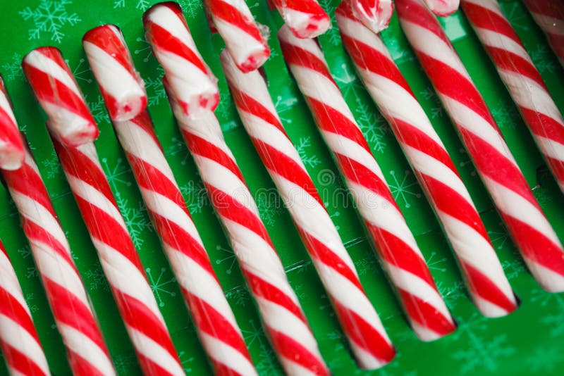 Candy canes in green pack stock photo. Image of lollipop 45279604