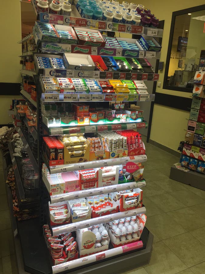 Candy, chewing gum and chocolate selection in supermarket royalty free stock image Candy, chewing gum and chocolate selection in supermarket royalty free stock image