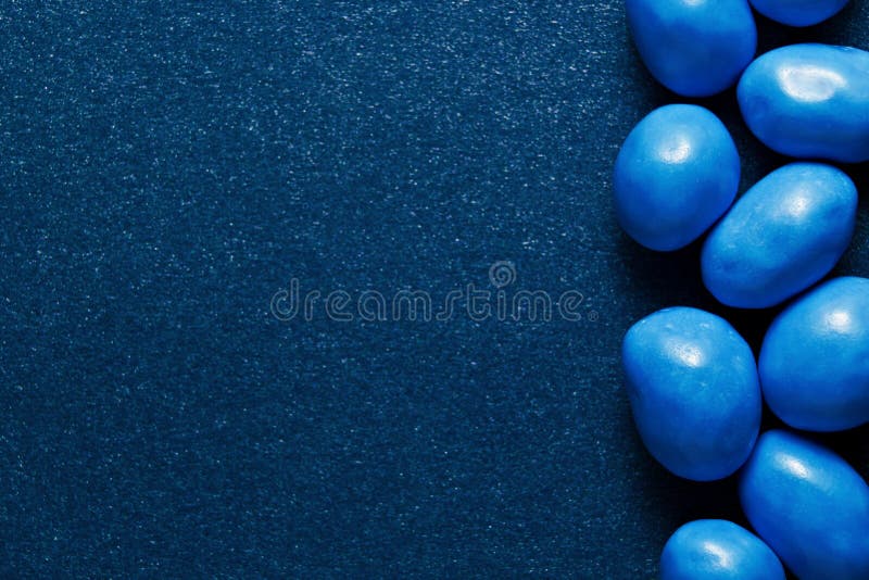 Candy on Classic Blue 2020 Color Background. Food Minimalism Stock Image -  Image of design, color: 168499861