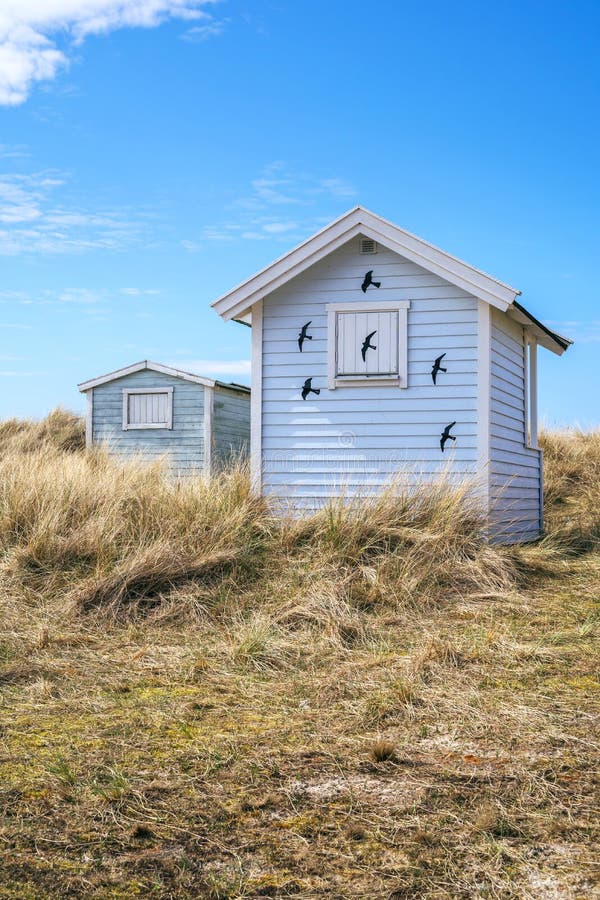 Candy coloured beach hut on Skanor beach in Falsterbo, Skane, Sweden. Swedish tourism concept