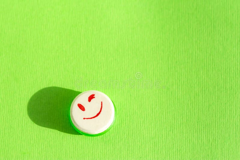 Smiling Caramel On A Green Background A Beautiful Bright And Funny Smiley Face Stock Photo Image Of Decoration Colorful