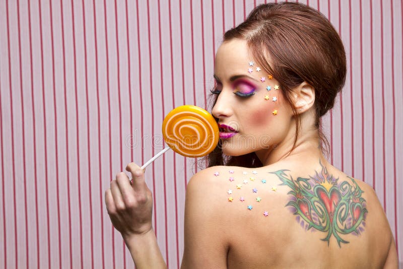 Candy, tattoo and lollipop.