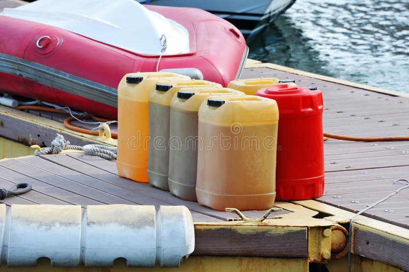 Canister with Fuel and Boat Stock Photo Image of benzine, caoutchouc
