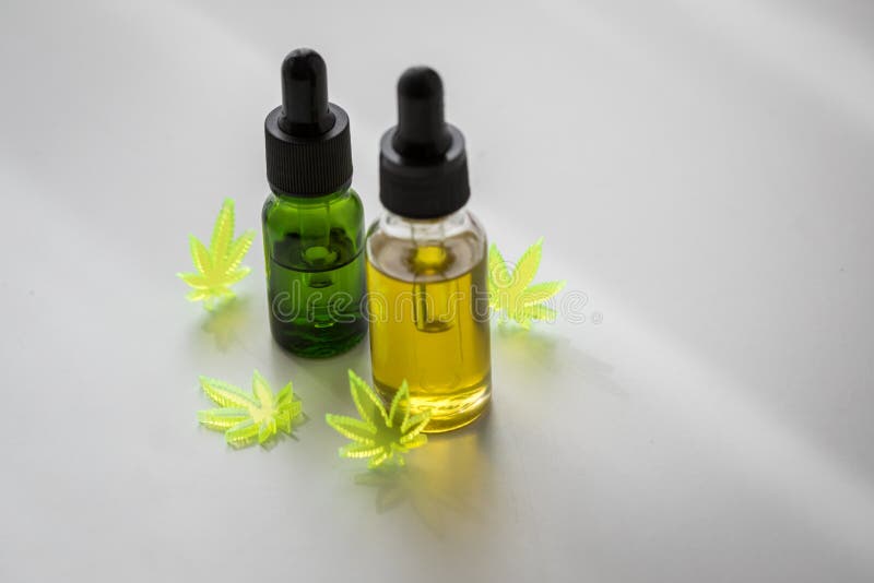 Cannabis marijuana hemp CBD oil as pain killer and medical therapy stock photography Cannabis marijuana hemp CBD oil as pain killer and medical therapy stock photography