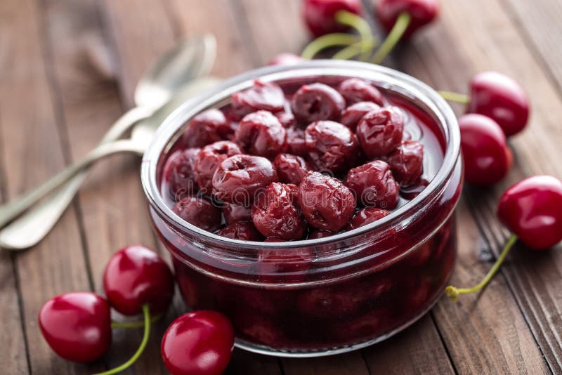 Canned Berries Cherry with Syrup in a Glass Jar Stock Photo Image of