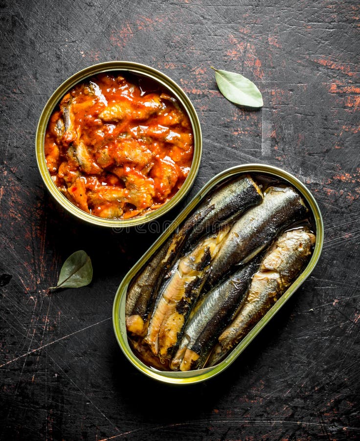 Canned fish in open cans stock photo. Image of preserve 150166806