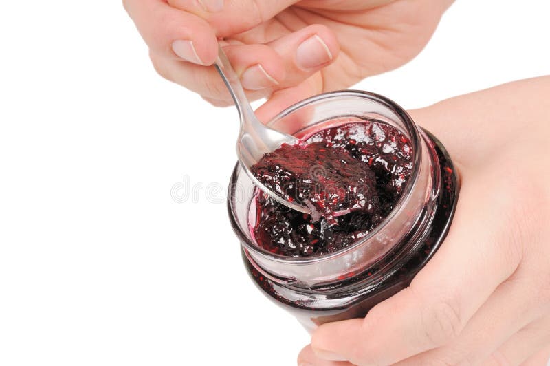 Canned jam and spoon royalty free stock photos Canned jam and spoon royalty free stock photos