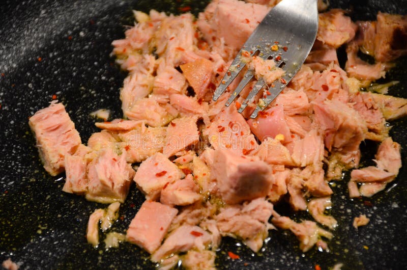 Canned tuna chunks stock photo. Image of cook, carbohydrates 84028816