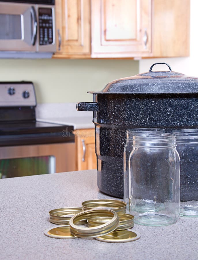 Canning Jars and Supplies in a Kitchen Stock Photo Image of lids