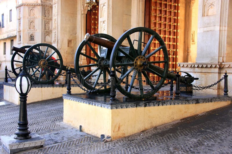 Cannons at City Palace complex gate, Udaipur, Rajasthan, India. Cannons at City Palace complex gate, Udaipur, Rajasthan, India