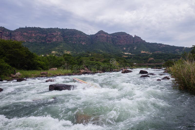 Canoe Jammed River Rapids royalty free stock images
