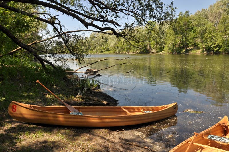 Canoe on the river bank